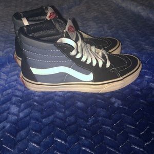 Vans high top tennis shoes sz 7 woman’s 5.5 mens (pre own) will complement jeans